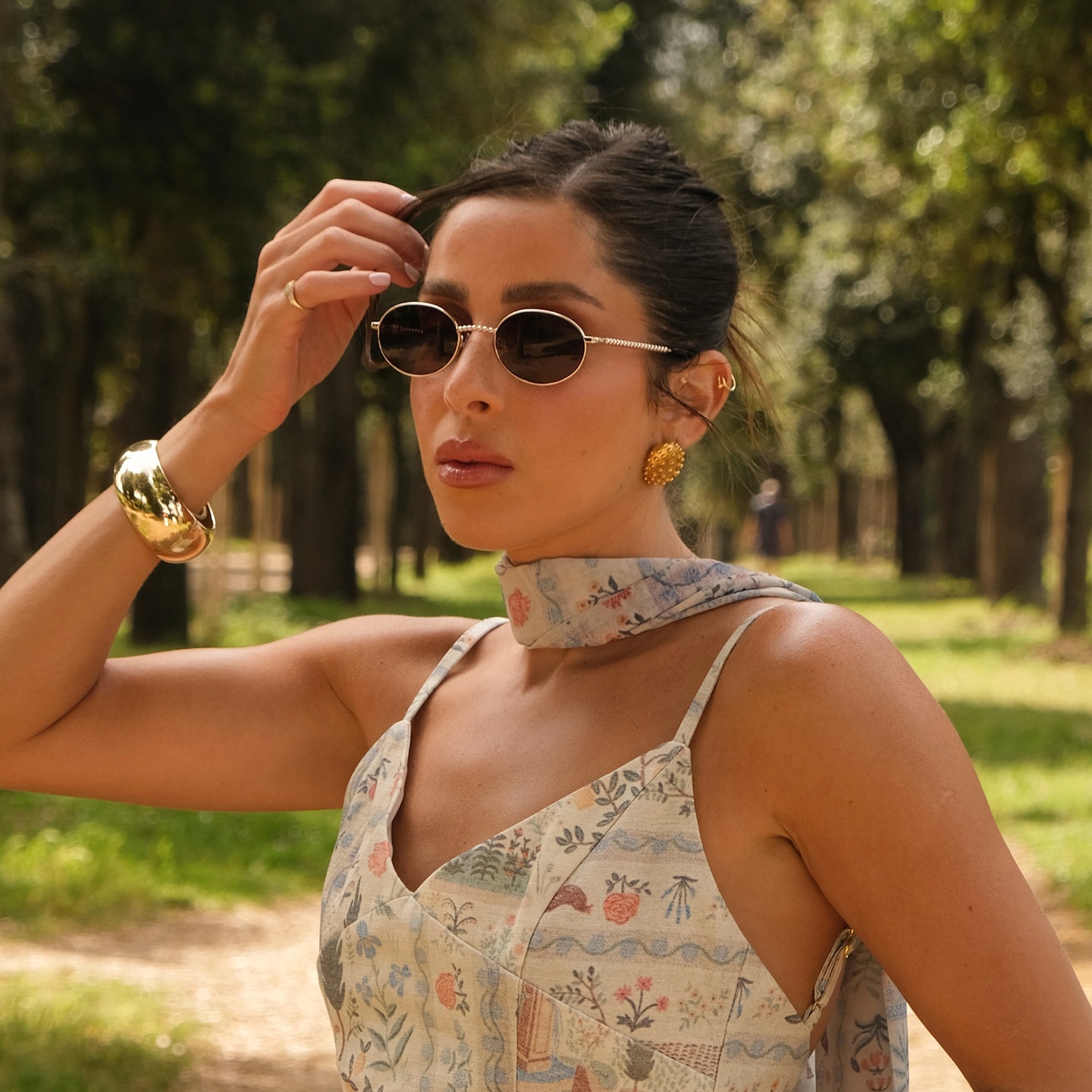 Shop TRICE Mila Chain Oval Sunglasses in Gold online.