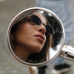 Shop TRICE Mila Chain Oval Sunglasses in Silver online.