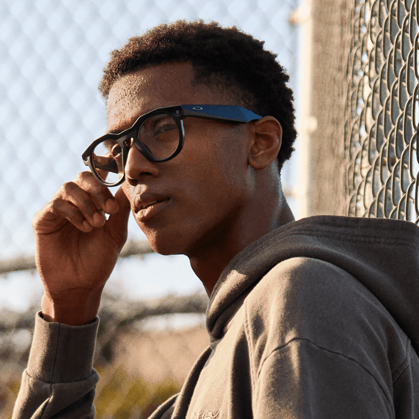 Shop Oakley Meta HSTN Limited Edition Unisex Round Eyeglasses with Blue-Violet Light Lenses in Black online.